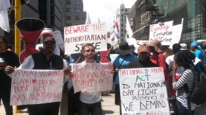 R2K activists protesting outside the South Gauteng High Court today.